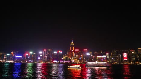 colorful lights reflecting on hong kong's waterfront