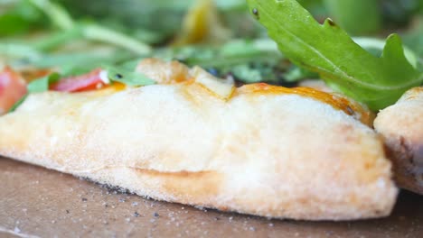closeup view of rotating delicious vegetarian pizza