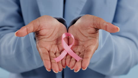 pink ribbon, hands and woman with breast cancer