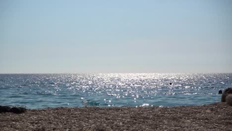 Stunning-summer-scenery-with-ocean-horizon-line-and-sparkling-sun