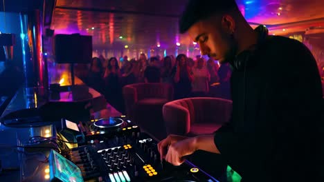 dj playing at nightclub