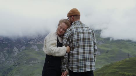 couple enjoying a scenic mountain view