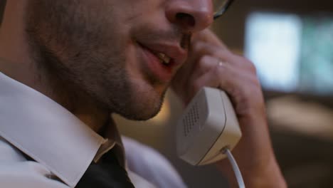 businessman on retro phone