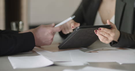 businesswoman and businessmam having conversation in meeting room