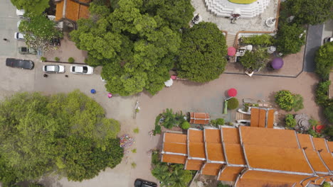 flying above wat ket karam buddhist temple in chiang mai, thailand. aerial topdown shot