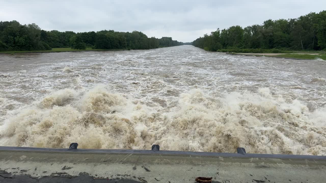 River Donau near peak level, during flood in bavaria, barrage bergheim near ingolstadt summer 2024