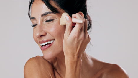 woman applying makeup