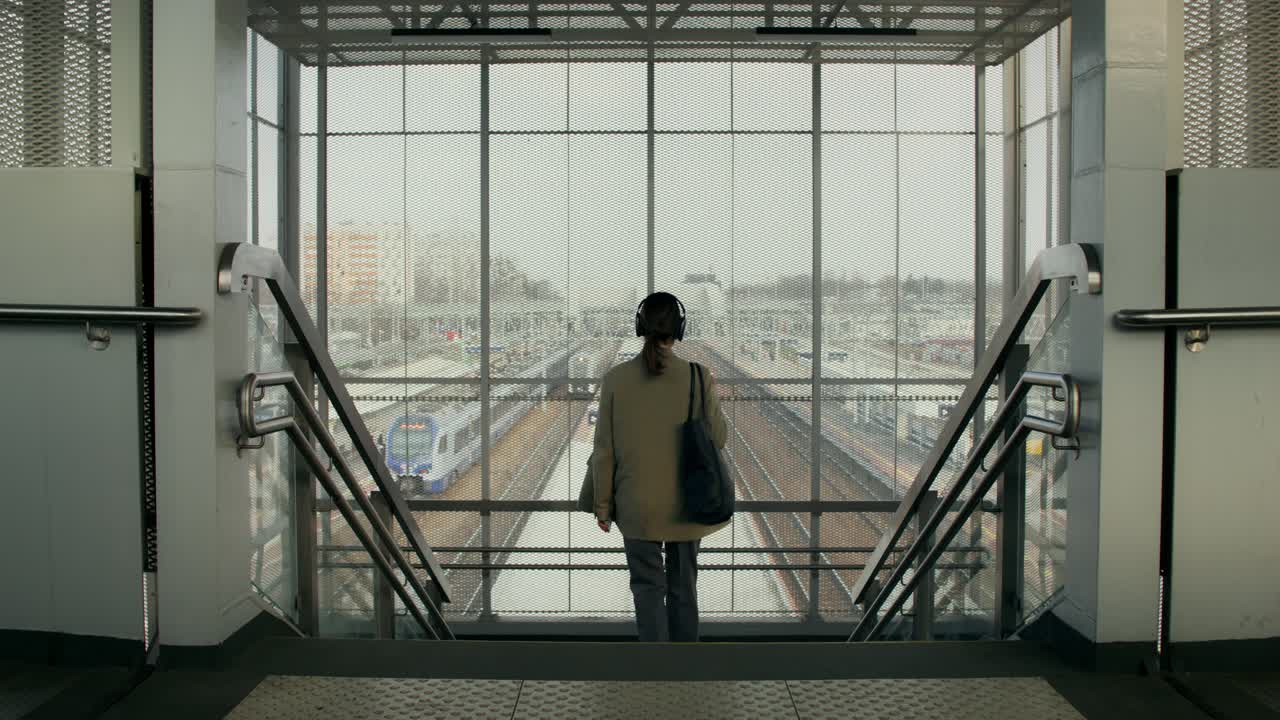 Woman at a train station