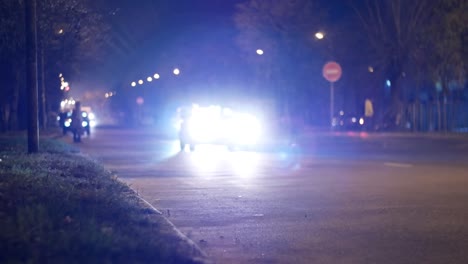 cinematic bokeh with night city street traffic. cars and people in the light of headlights and lanterns cinematic bokeh with night city street traffic. cars and people in the light of headlights and lanterns