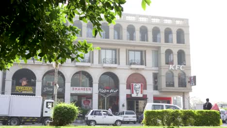 kfc and pizza hut in a pakistani shopping center