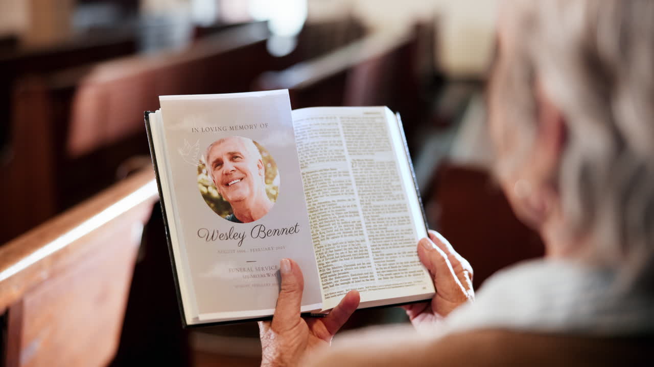 Reading a Funeral Booklet in Church