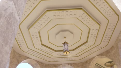 ornate octagonal ceiling with light fixture