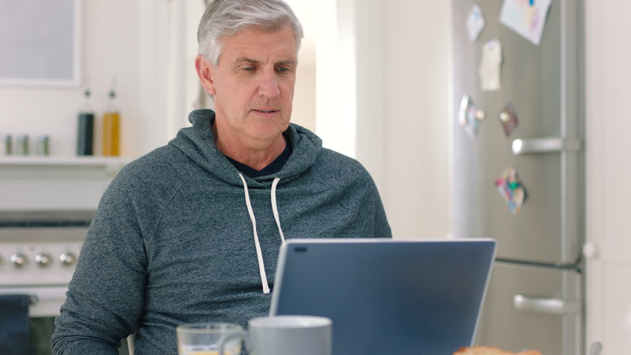 Breakfast, online video and business man working