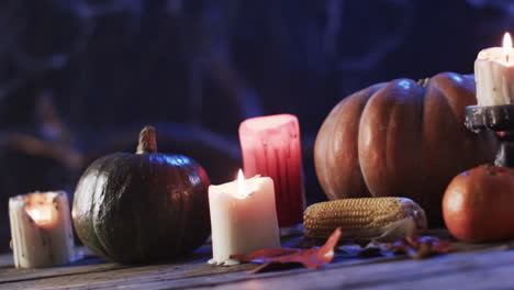 candles and pumpkins set a cozy autumn mood, with copy space