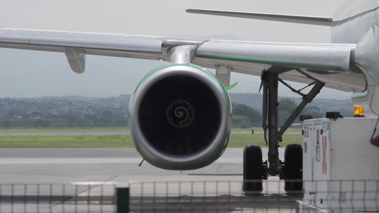 SLOW MOTION SHOT OF AN A320 TURBINE SPINNING