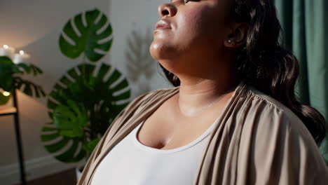 woman meditating at home