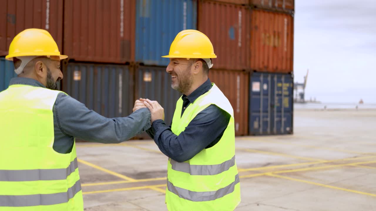 Industrial engineer people working at container cargo logistics terminal port - Freight operator deal