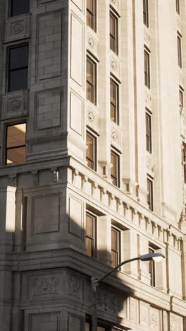 close-up of a modern building exterior with windows and intricate details.