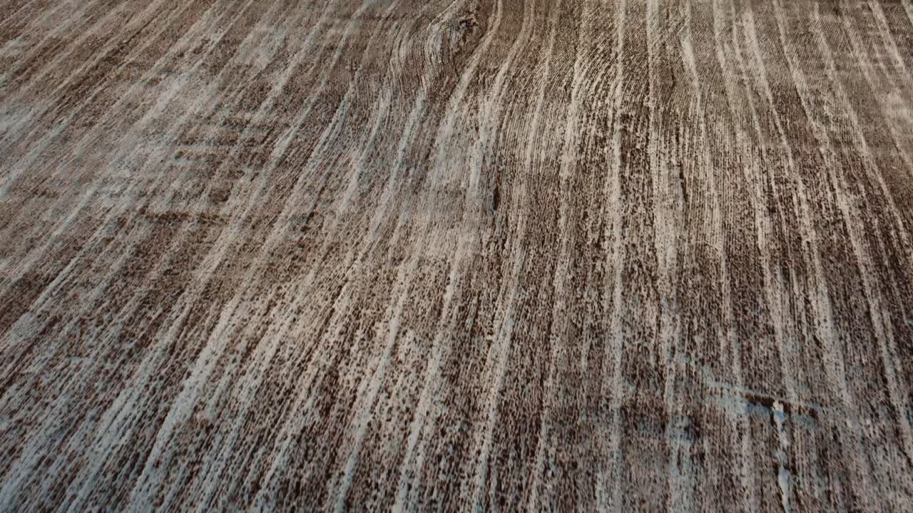 Flying over farmer's fields in the middle of winter in Canada