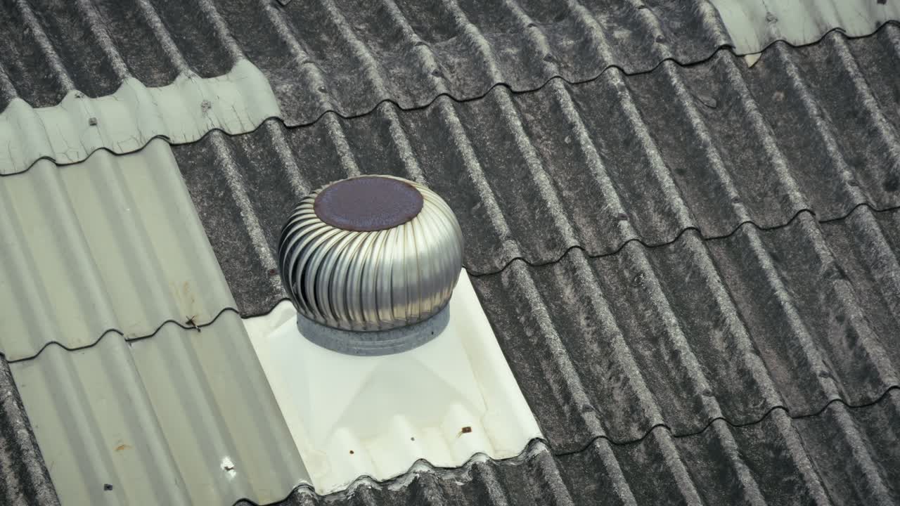 A detailed look at an industrial roof ventilation system showcasing its design and functionality.