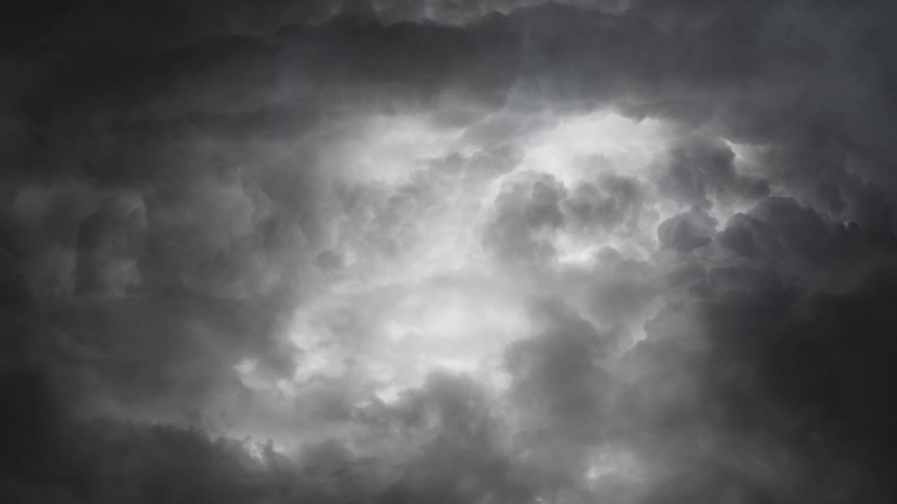 thunderstorm and dark clouds in dark sky