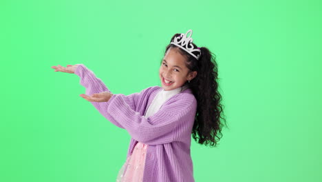 girl in princess costume presenting on green screen