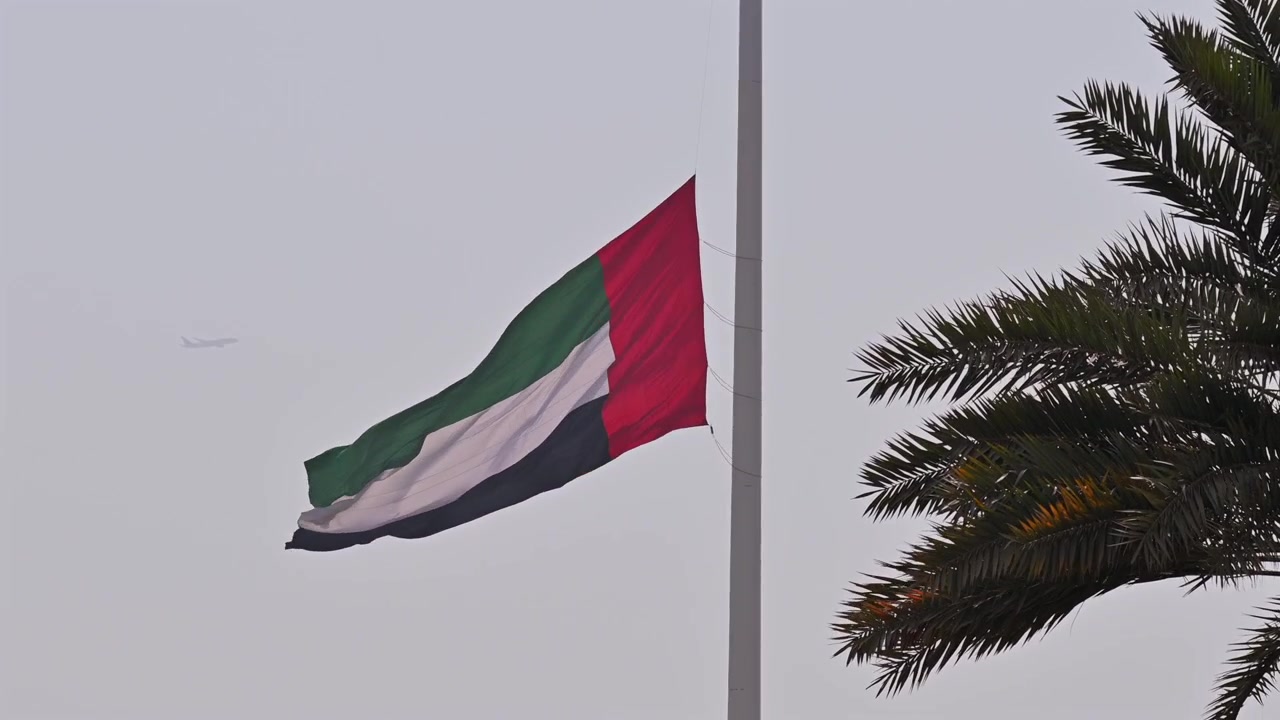The UAE flag at half-mast honouring a period of national mourning.