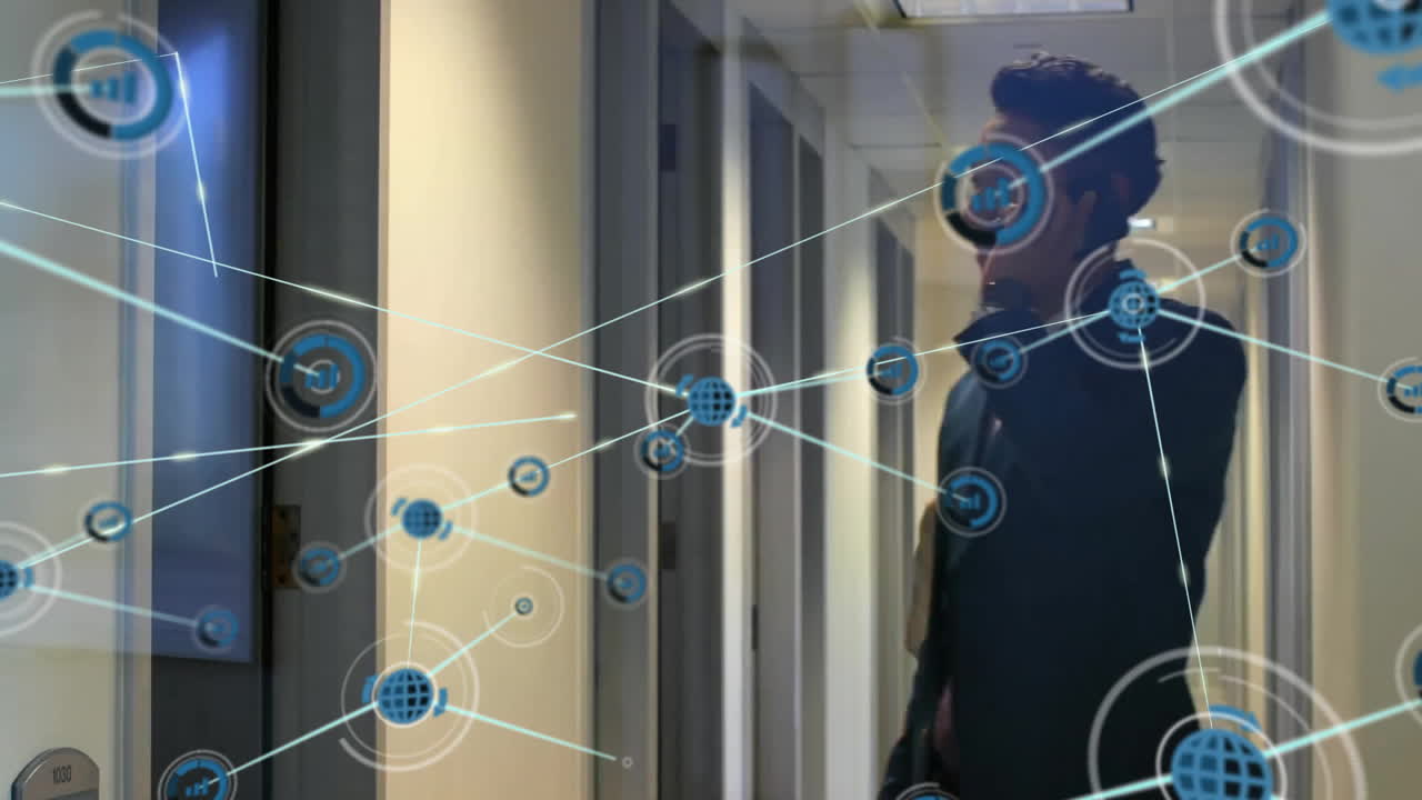 Animation of network of connections with icons over diverse business people in office