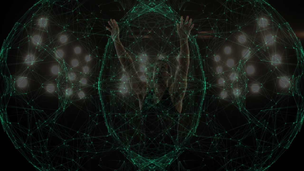 Person raising arms with digital network animation over stage lights in background