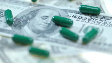 Herbal-capsules-on-dollar-cash.-Medical-finance.-Healthcare-business