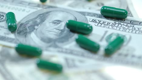 herbal capsules on dollar cash. medical finance. healthcare business