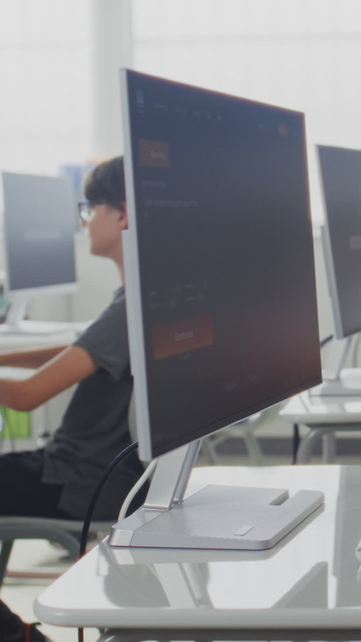 Elementary School Children Using Computers Doing Creative 3D Design Projects