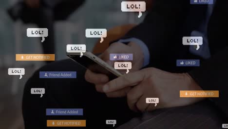 animation of social media icons floating against mid section of businessman using smartphone