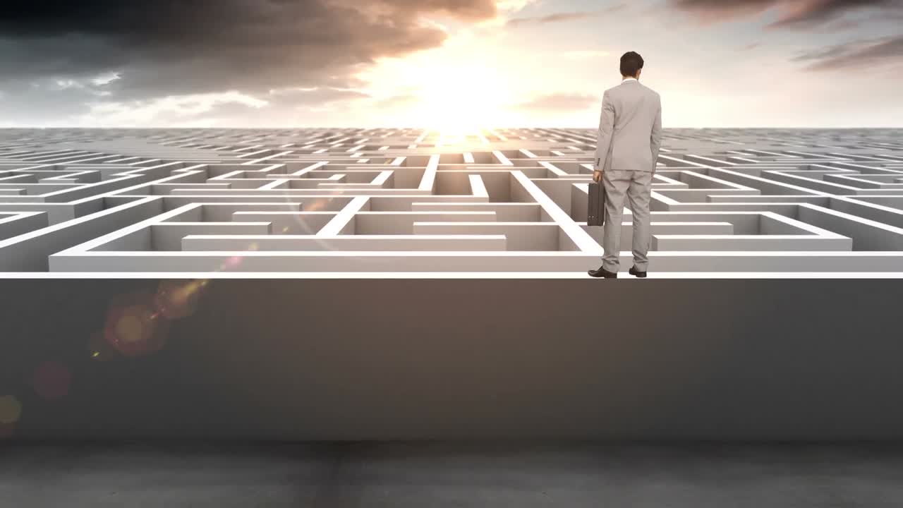 Businessman at entrance of maze