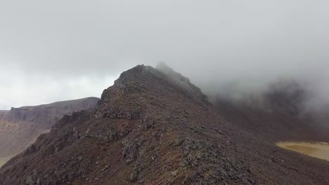 aerial view of a foggy volcano