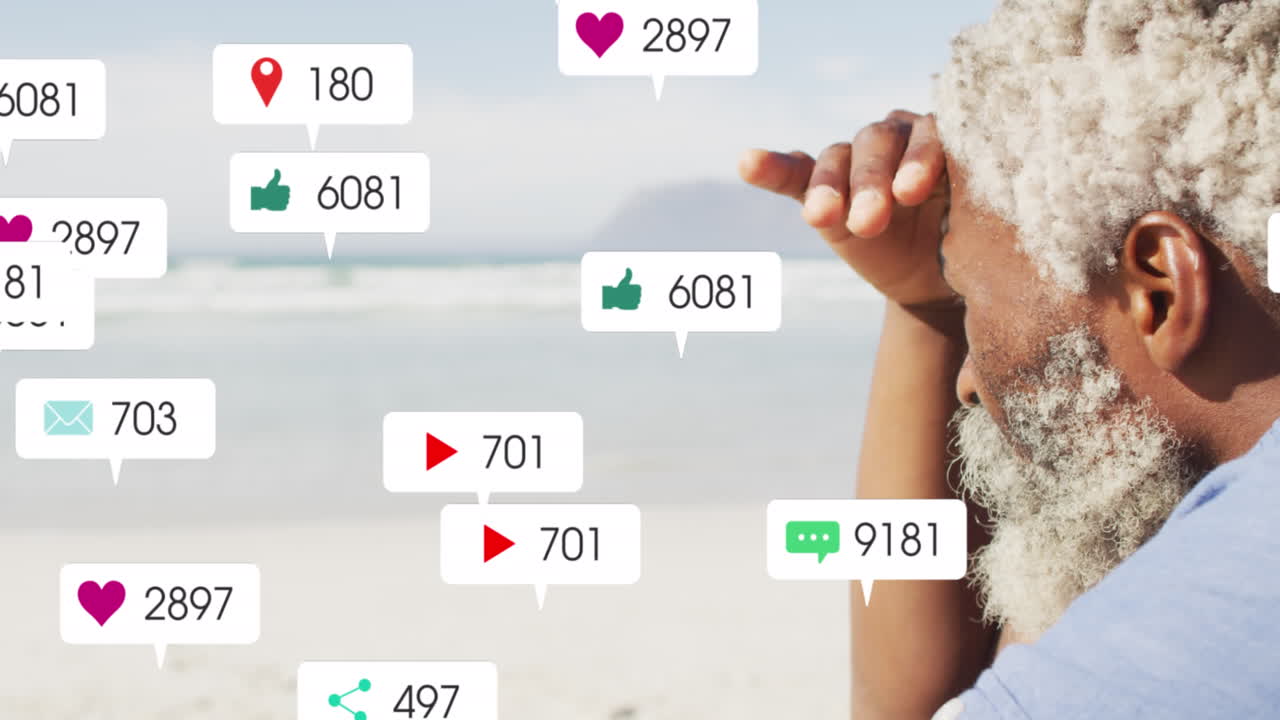 animación de iconos de notificación con números sobre un hombre mayor afroamericano mirando al mar