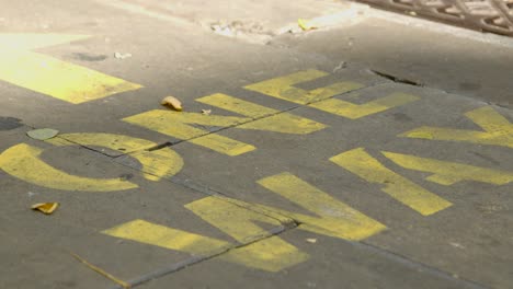 close up of one way pavement marking in oxford england