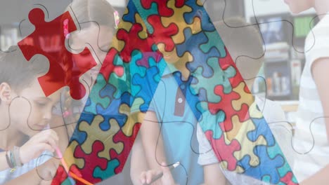 Animation-of-colourful-puzzle-pieces-ribbon-over-school-children-using-tablets