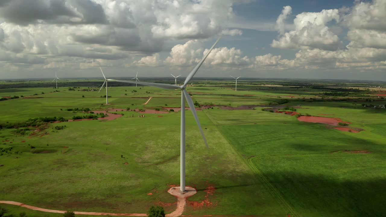 Aerial View of Wind Turbines Rotating