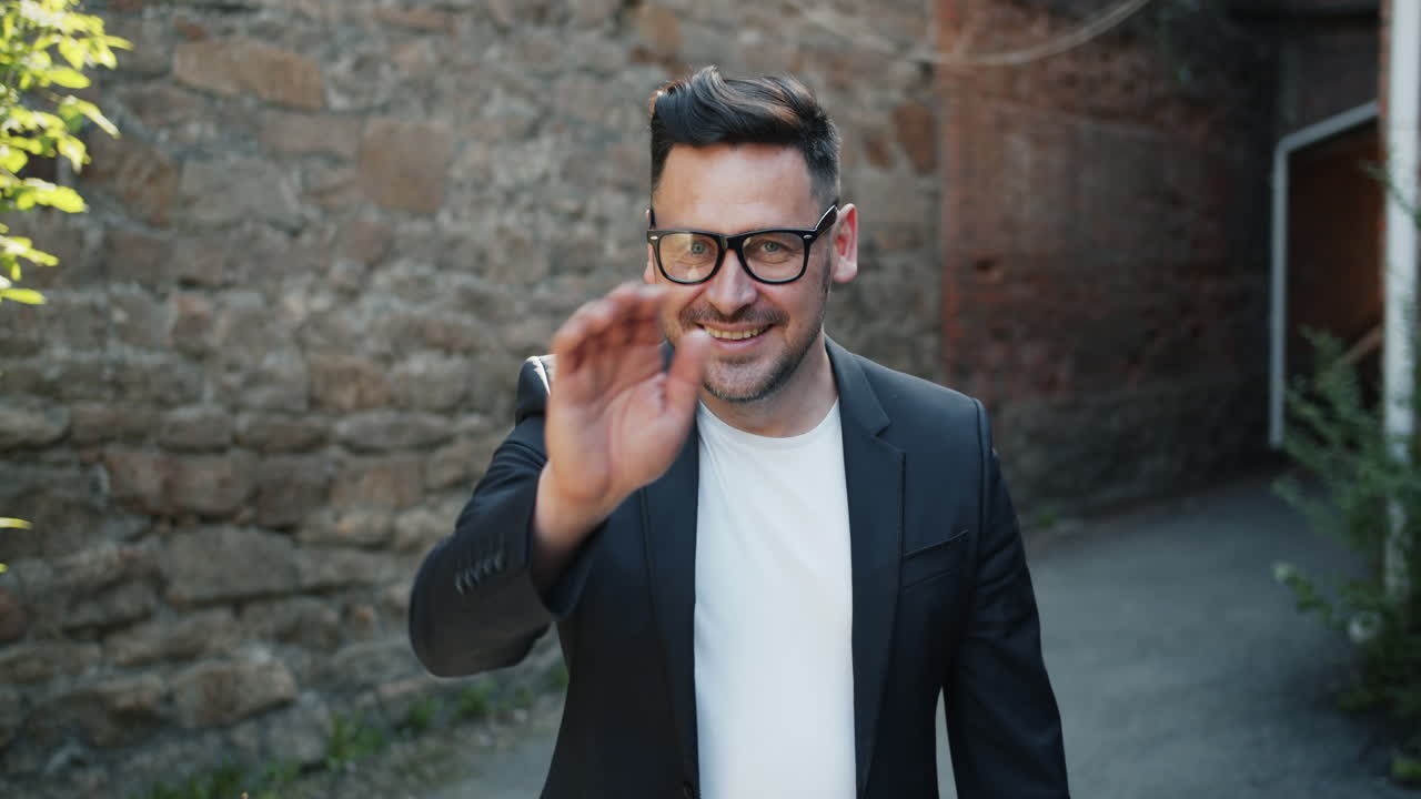 Man in a suit smiling