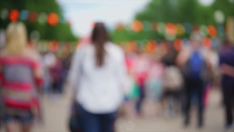 blurred crowd at an outdoor festival or event