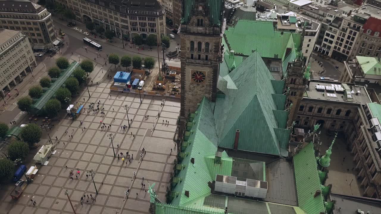 flying around the town hall of Hamburg Germany, circeling