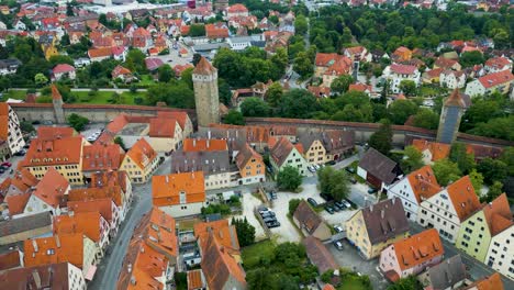 4k aerial drone video of the röderturm tower on the walled city of rothenburg, germany