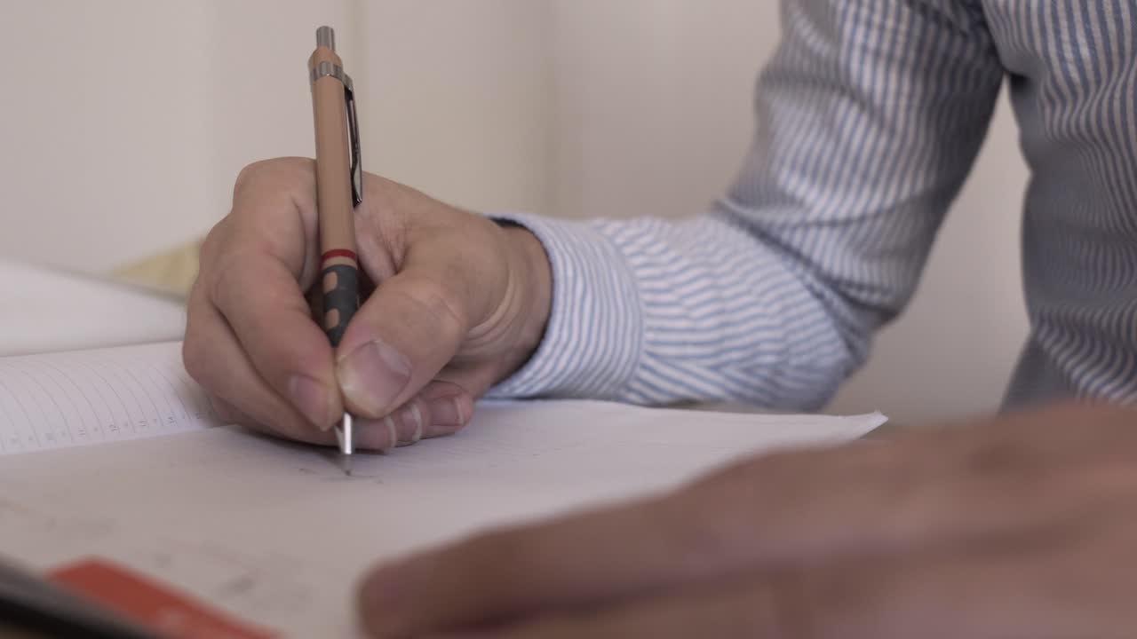 Man writing notes