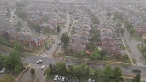 Aerial-view-of-a-downtown-city-on-a-rainy-day-with-busy-traffic-on-the-roads