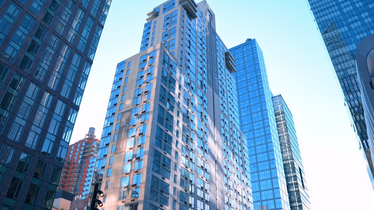 New York, USA, 4 August 2025: Highrise residential and office towers in Hudson Yards district. A tall residential and office building among modern skyscrapers in Hudson Yards