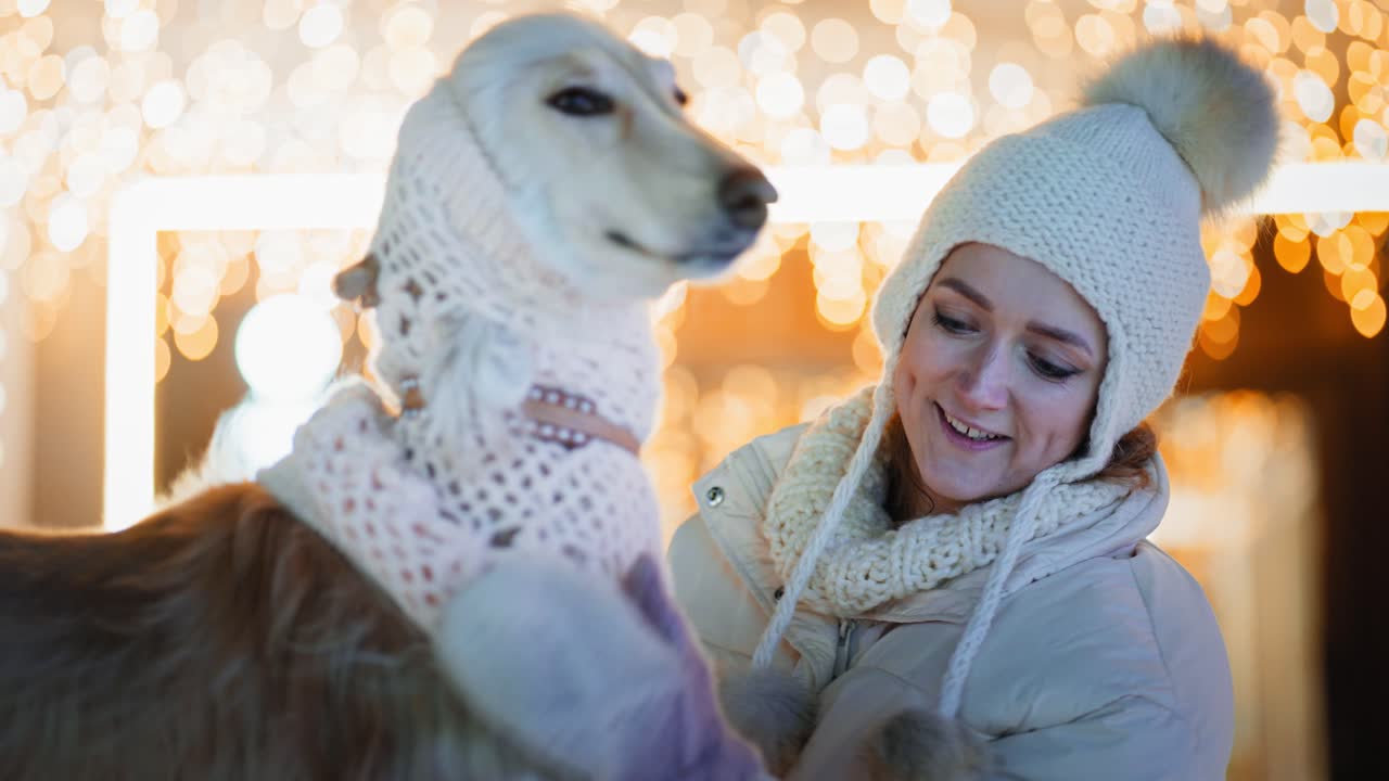 Woman and Saluki Dog Enjoying a Winter Evening
