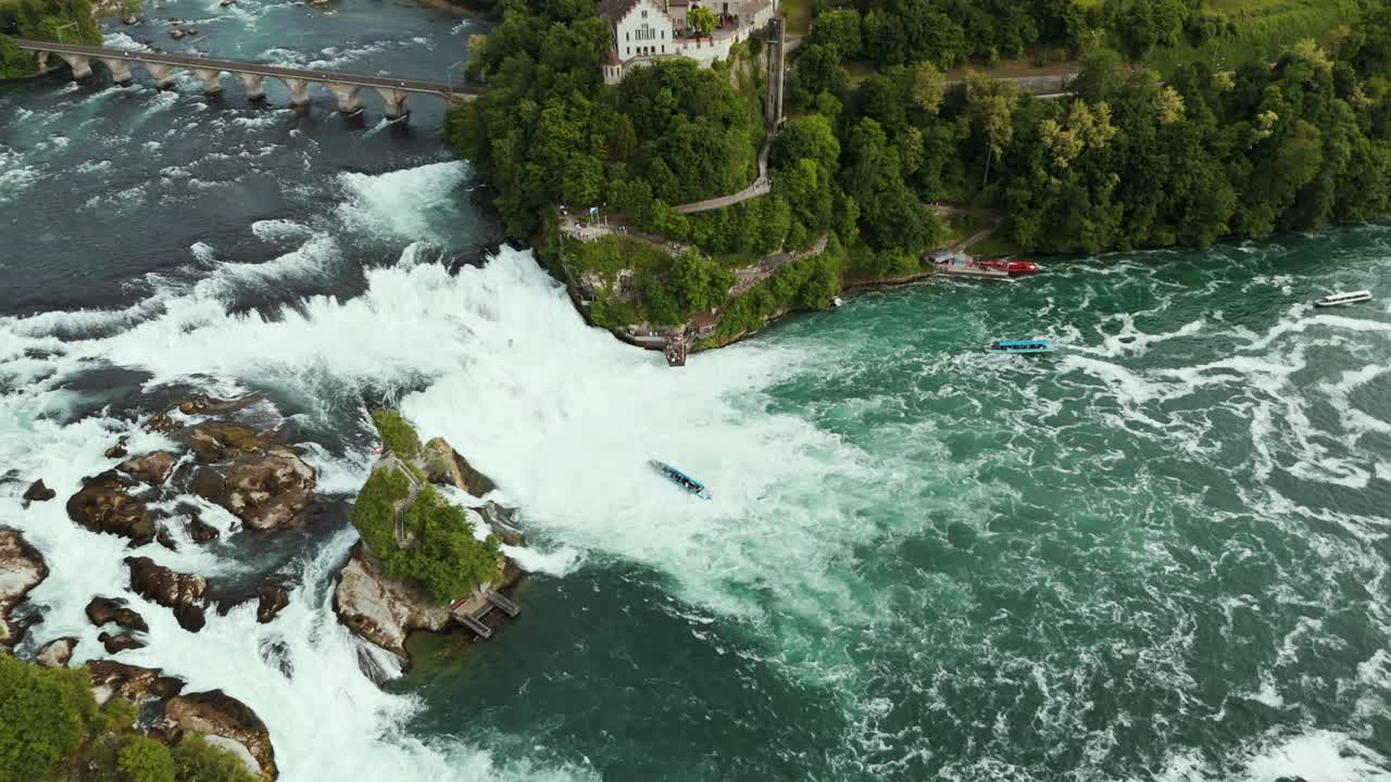 Aerial view of Rhine Falls in Schaffhausen, Switzerland – powerful natural wonder with boats