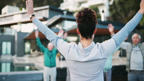 group of people exercising outdoors