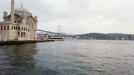 ortaköy mosque in istanbul at bosphorus strait during cloudy day